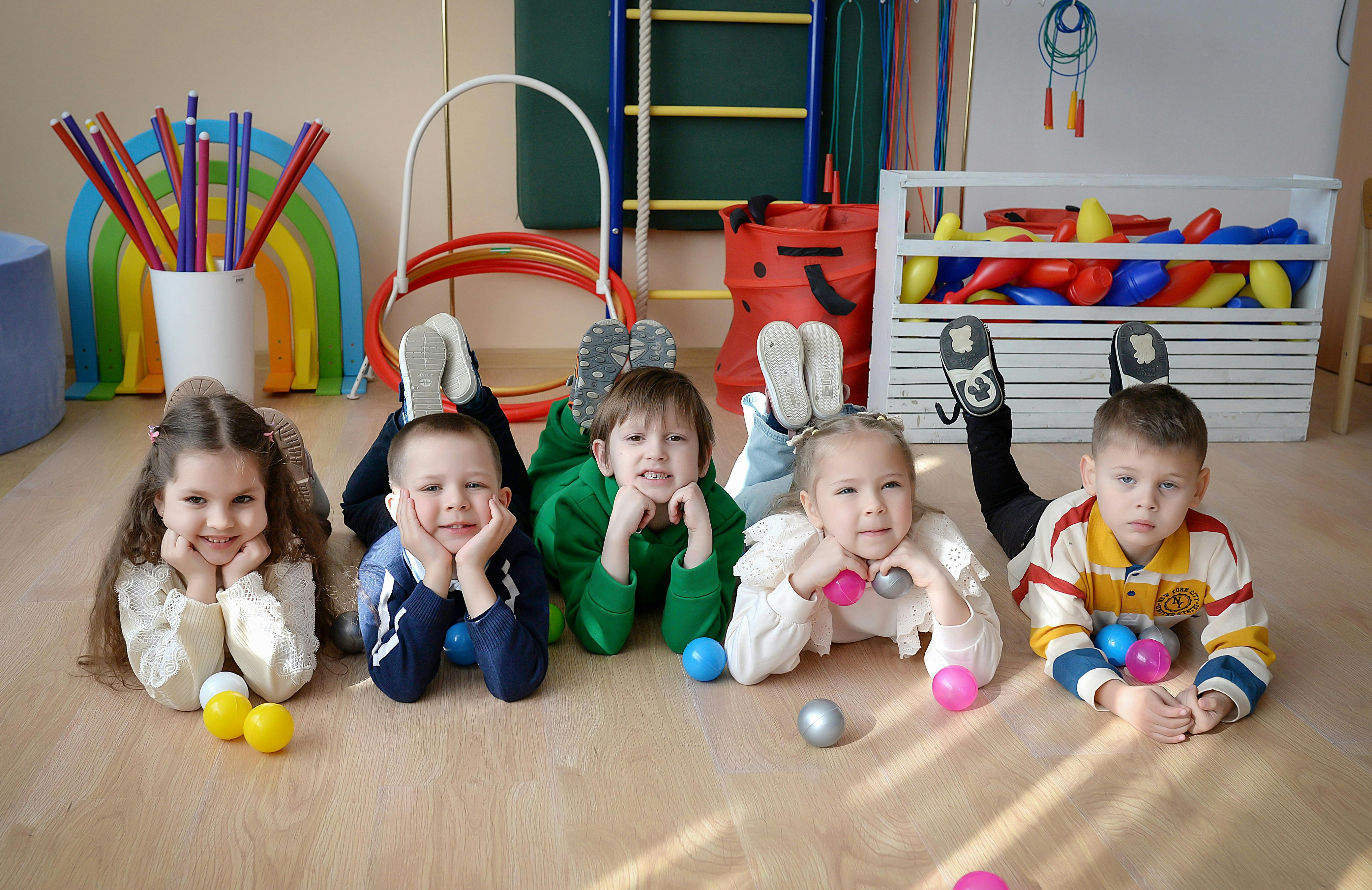 Young children at childcare club benefiting from free childcare UK and Best Start in Life